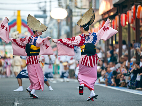 Yamato, Kanagwa Prefecture, Japan - July 26, 2015: Japanese women Japanese kimono dancing on the street during the 39th Kanagawa Yamato Awaodori Dance Festival.