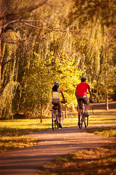 istock Young Couple Biking Exercise in Autumn 487474644