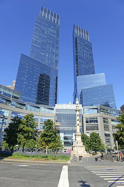 Time Warner Center in Manhattan with blue sky New York, USA. September 7, 2015: Located near many of Manhattan’s attractions, the iconic Time Warner Center is a tourist hotspot with a variety of shopping and restaurants to suit many tastes. time warner center columbus circle pictures stock pictures, royalty-free photos & images