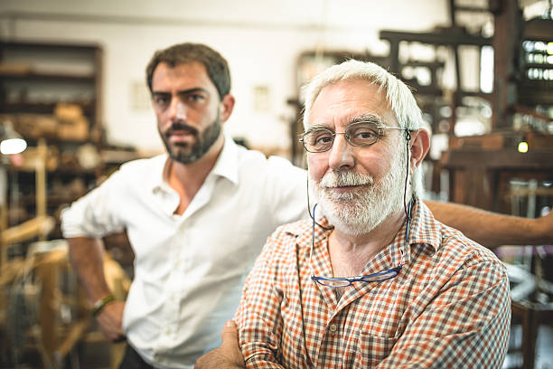 Portrait of Father and Son Entrepreneur stock photo