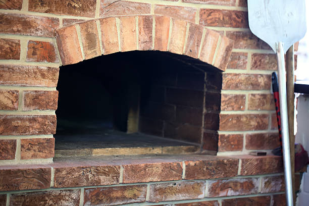 istock brick oven pizza background retro vintage 487476230
