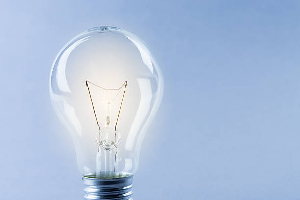 istock Glowing yellow light bulb, busienss idea concept 487476532