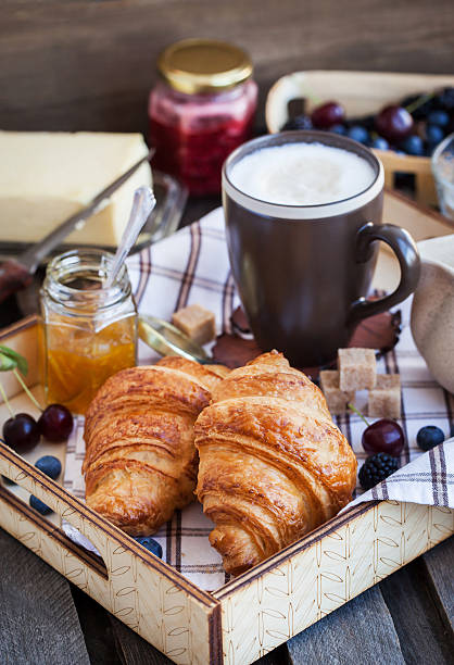 istock Breakfast with croissants, cappuccino and jam 487476894