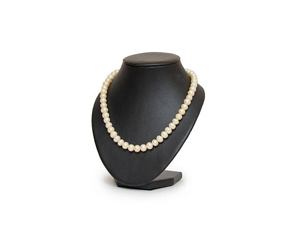 istock Pearl necklace on black mannequin isolated 487479686
