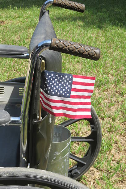 istock US flag and a wheelchair, 487481870