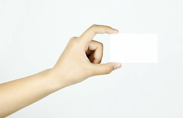 istock Blank business card in a hand 487485417
