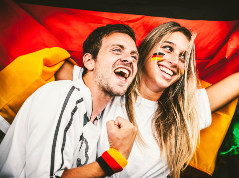German supporters cheering at the stadium.