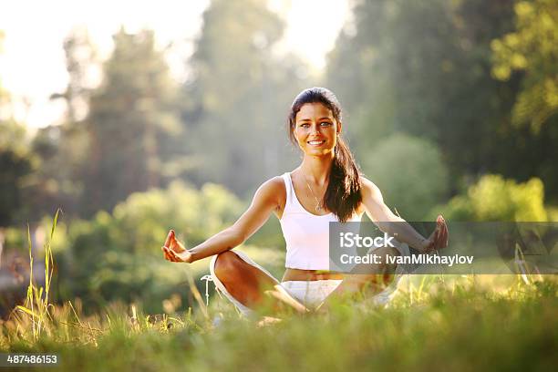 Lotus Yoga Stock Photo - Download Image Now - Adult, Adults Only, Balance