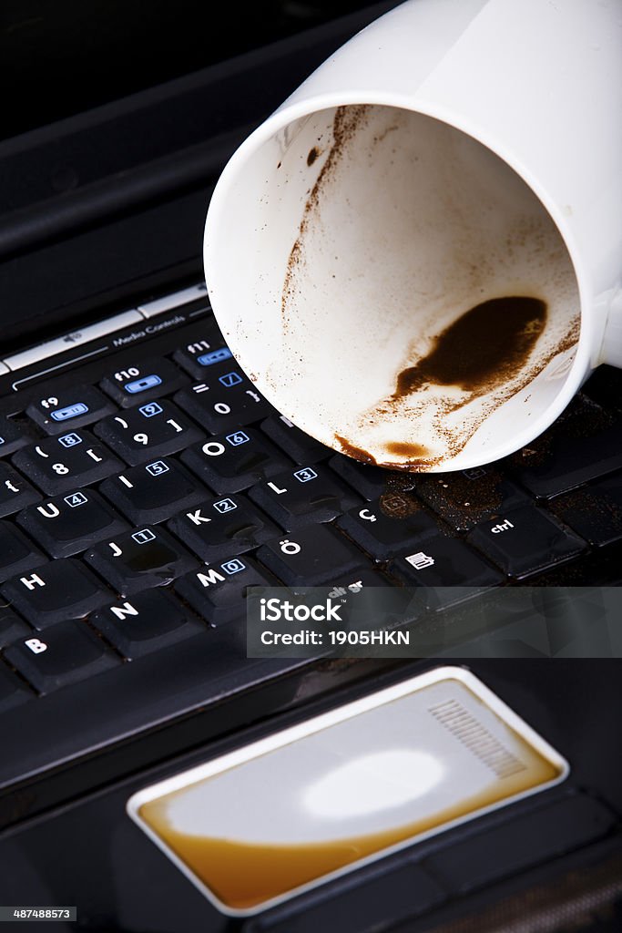 coffee keyboard coffee dirty computer keyboard Laptop Stock Photo