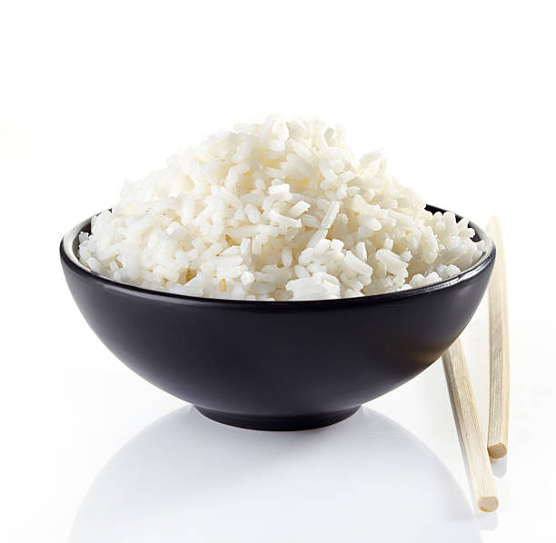 istock bowl of boiled rice on a white background 487490931