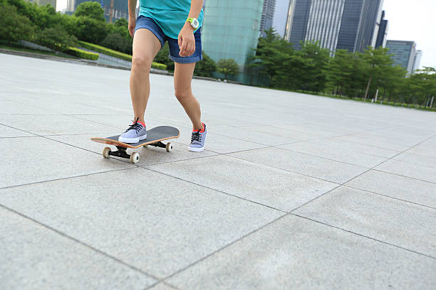 istock skateboarder skateboarding at  city 487494266