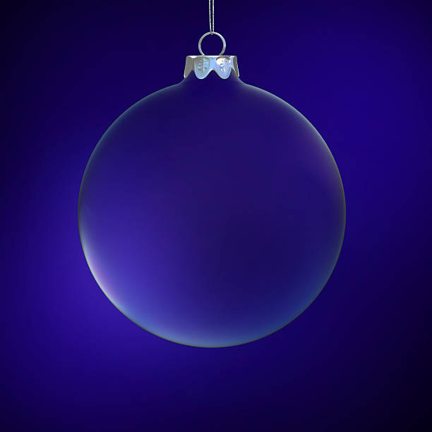 Blue Christmas tree ball against a white background