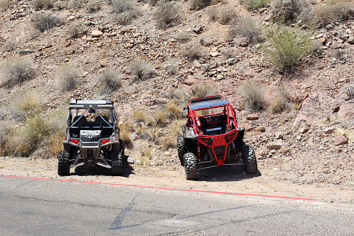 Four wheelers (4x4) racinging aound in desert