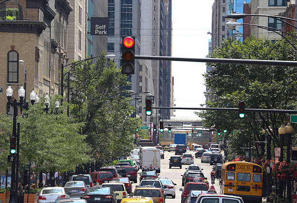 istock Urban traffic scene with stoplights 487502382