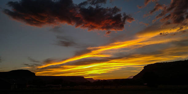 istock Sunset clouds over Virgin River Valley see from Rockville Utah 487505086