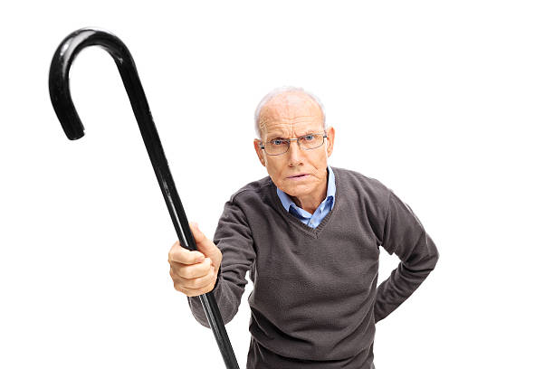 istock Displeased senior scolding someone 487511110