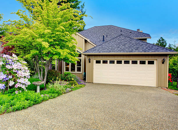 istock House exterior. Garage and driveway view 487511275