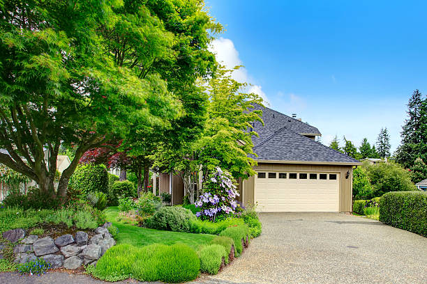 istock House exterior. Garage and driveway view 487511825