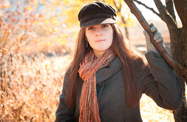 istock Smiling girl in autumn 487512796