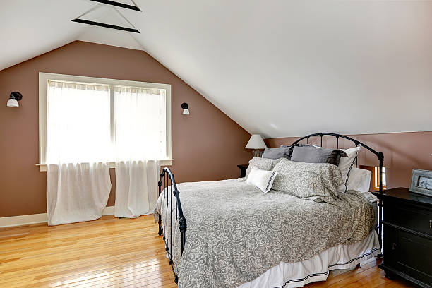 istock Velux bedroom with antique bed 487512843