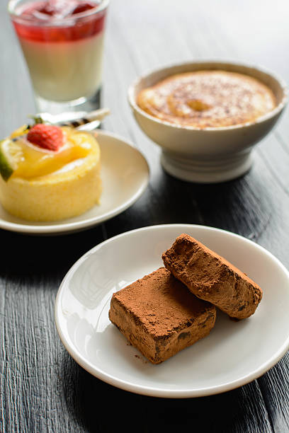 istock Chocolate, cake and dessert on wooden table 487512968