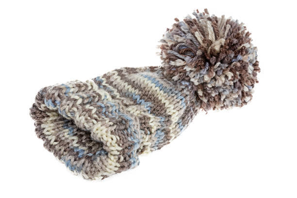 istock Warm woolly winter hat with a huge pompom 487512997
