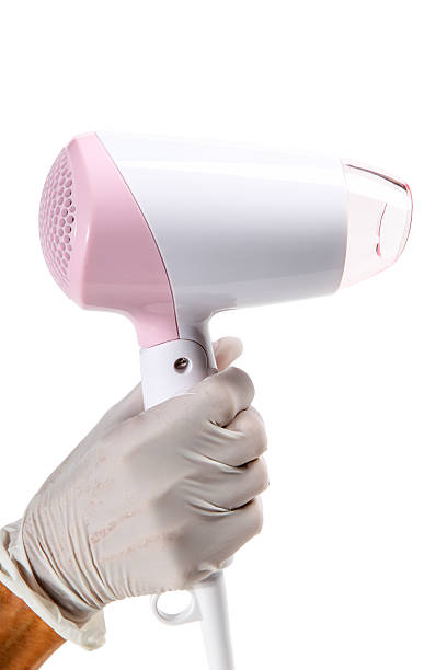 istock Hair dryer isolated on white 487514430