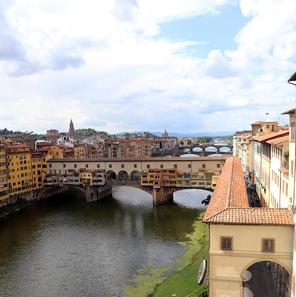 istock Florence Italy houses and shops in the ancient bridge 487519964