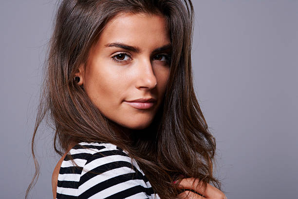 istock Girl with big brown and hypnotising eyes 487520344