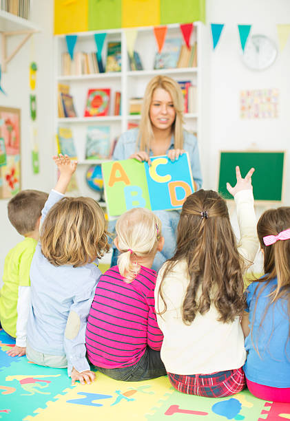 istock Cute kids in kindergarden. 487521217