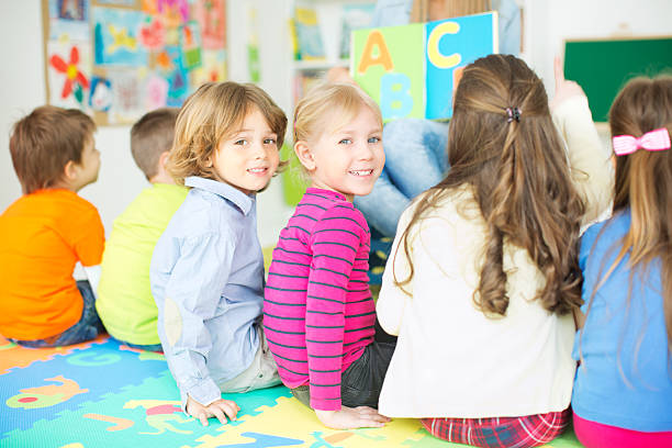 istock Cute kids in kindergarden. 487521311