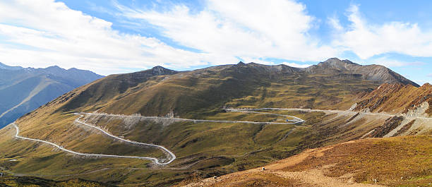 istock Mountain landscape with white sutra streamer scattered on the gr 487521794