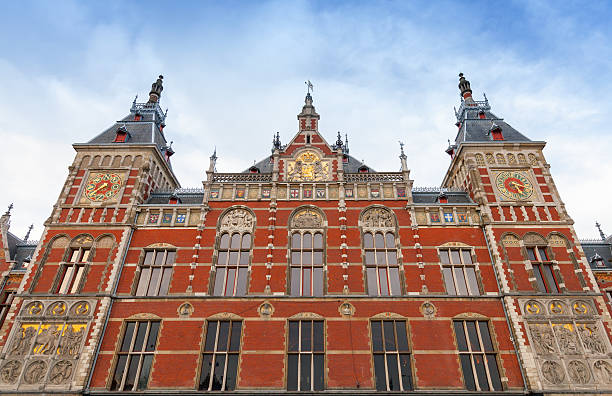 istock Facade of Amsterdam Centraal old building. Central railroad stat 487523859