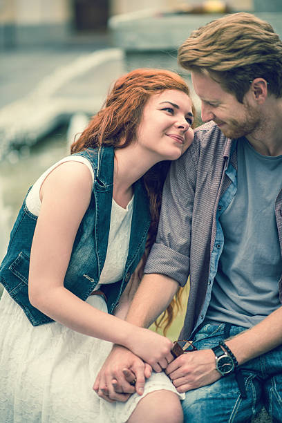 istock Smiling couple relaxing outdoors and enjoying in their love. 487526480