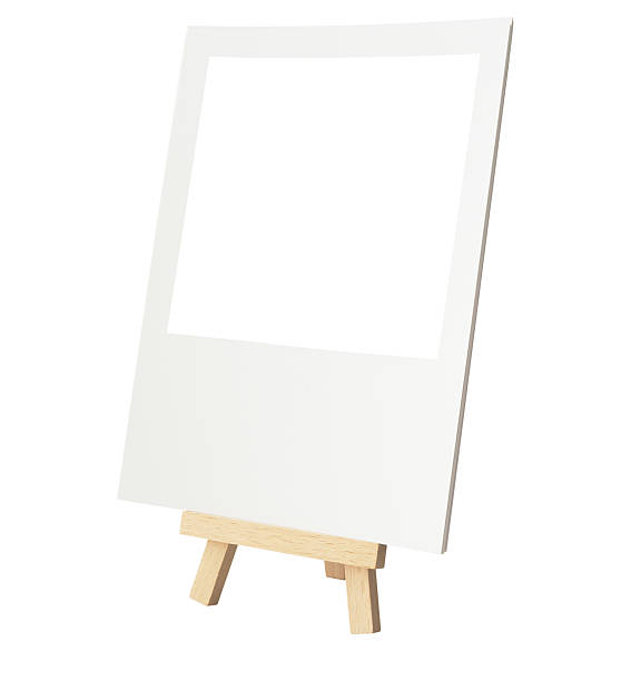 istock Rustic Easel Style Wooden Tripod Blank Photo isolated on white 487527122