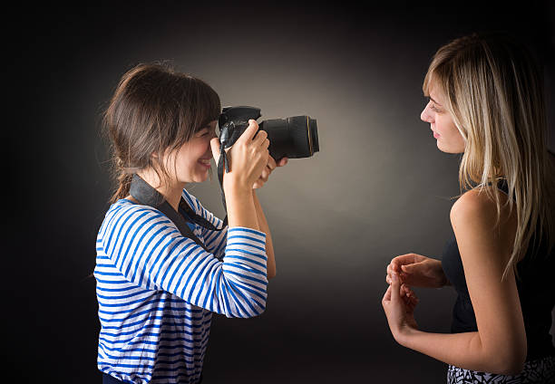 istock two girls are photographed 487527222