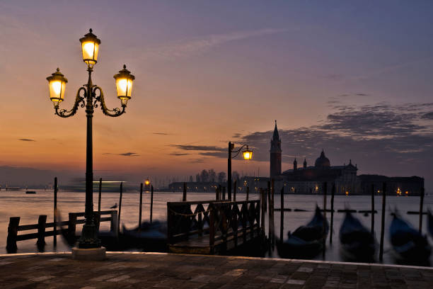 San Giorgio Maggiore at sunrise across the Lagoon stock photo