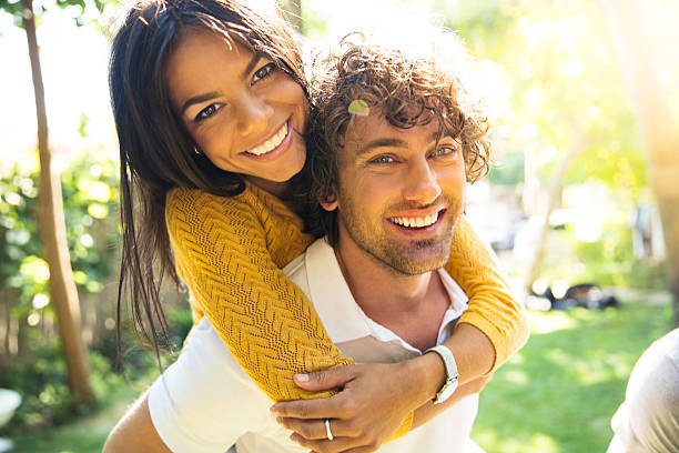istock Smiling couple outdoors 487528038