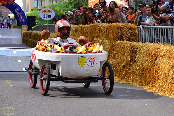 Montreal Red Bull Soapbox Race Montreal, Canada - September 06, 2015: Montreal Red Bull Soapbox Race in Montreal Downtown.A lot of fun and ingenious ideas.Number 43 team. red bull mini stock pictures, royalty-free photos & images