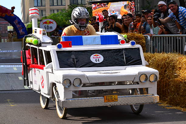Montreal Red Bull Soapbox Race Montreal, Canada - September 06, 2015: Montreal Red Bull Soapbox Race in Montreal Downtown.A lot of fun and ingenious ideas.Number 44-Ghostbusters team. red bull mini stock pictures, royalty-free photos & images