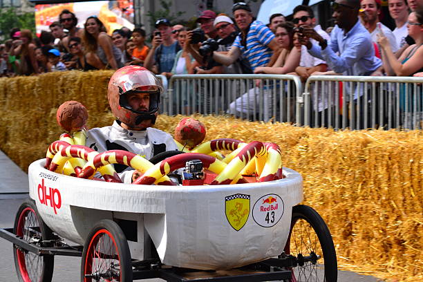 Montreal Red Bull Soapbox Race Montreal, Canada - September 06, 2015: Montreal Red Bull Soapbox Race in Montreal Downtown.A lot of fun and ingenious ideas.Number 43 team. red bull mini stock pictures, royalty-free photos & images