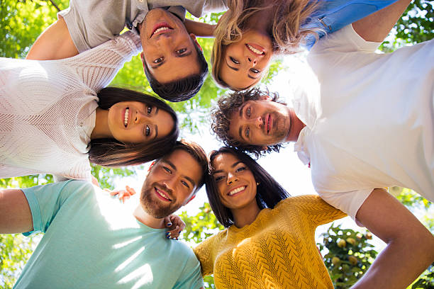 istock Friends hugging together at the park 487531688