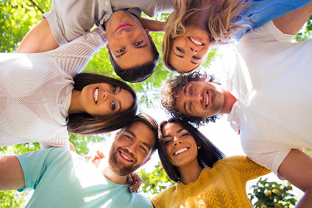 istock Friends hugging together at the park 487531724