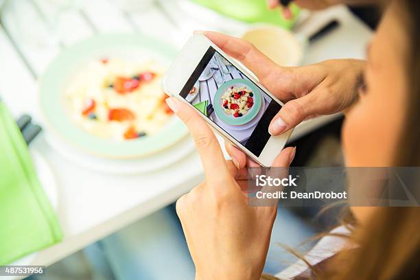 Woman Making Photo Of Food On Smartphone Stock Photo - Download Image Now - Auto Post Production Filter, Food, Social Media