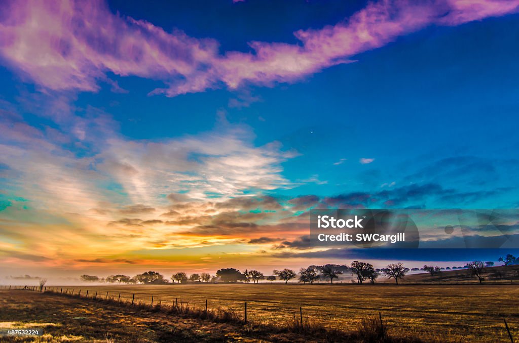 God with a paintbrush Sunrise over the ranch Texas Stock Photo