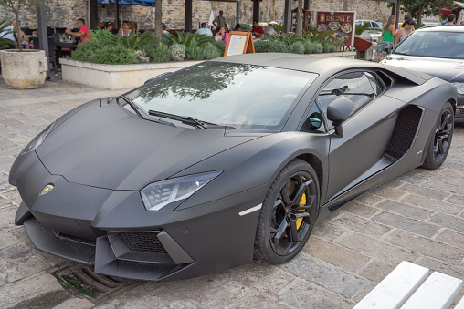 Budva, Montenegro - September 5, 2015: luxury sport car Lamborghini parks in the street near the port area.