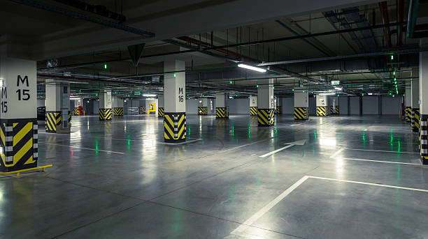 istock Parking garage, underground interior with a few parked cars 487532556
