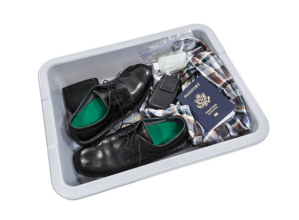 Airport Screening Security Tray Airport screening security tray isolated with clipping path. filing tray stock pictures, royalty-free photos & images