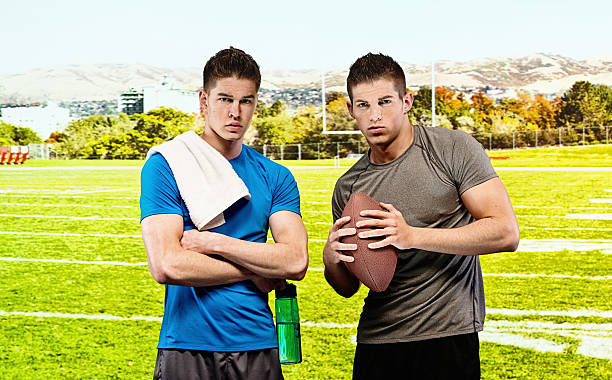 istock Two player at football field 487533649