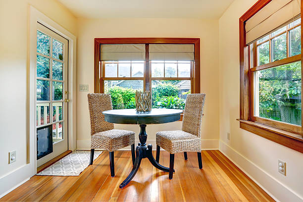 istock Decorated dining are with door to backyard 487533735